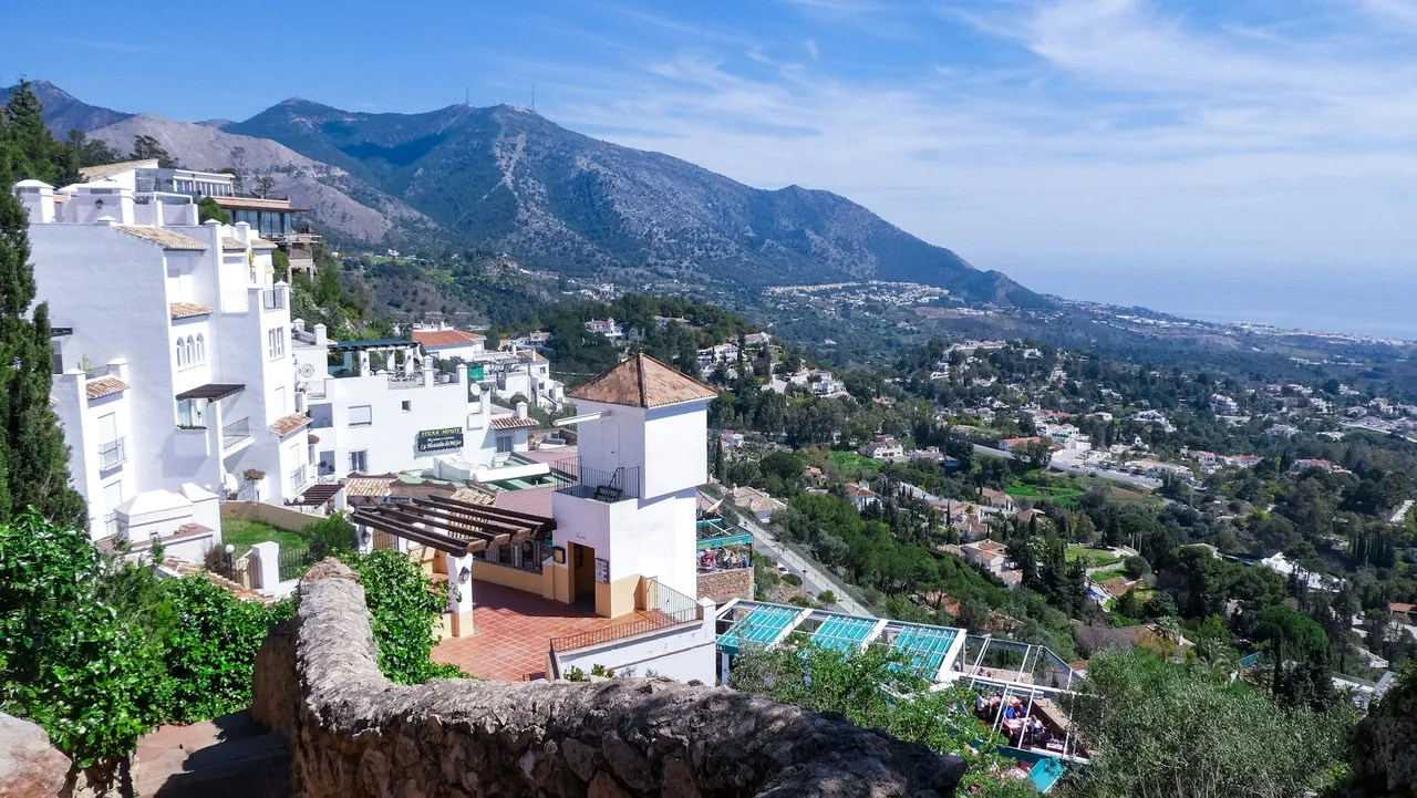 White houses of Mijas Pueblo, looking down towards the coast