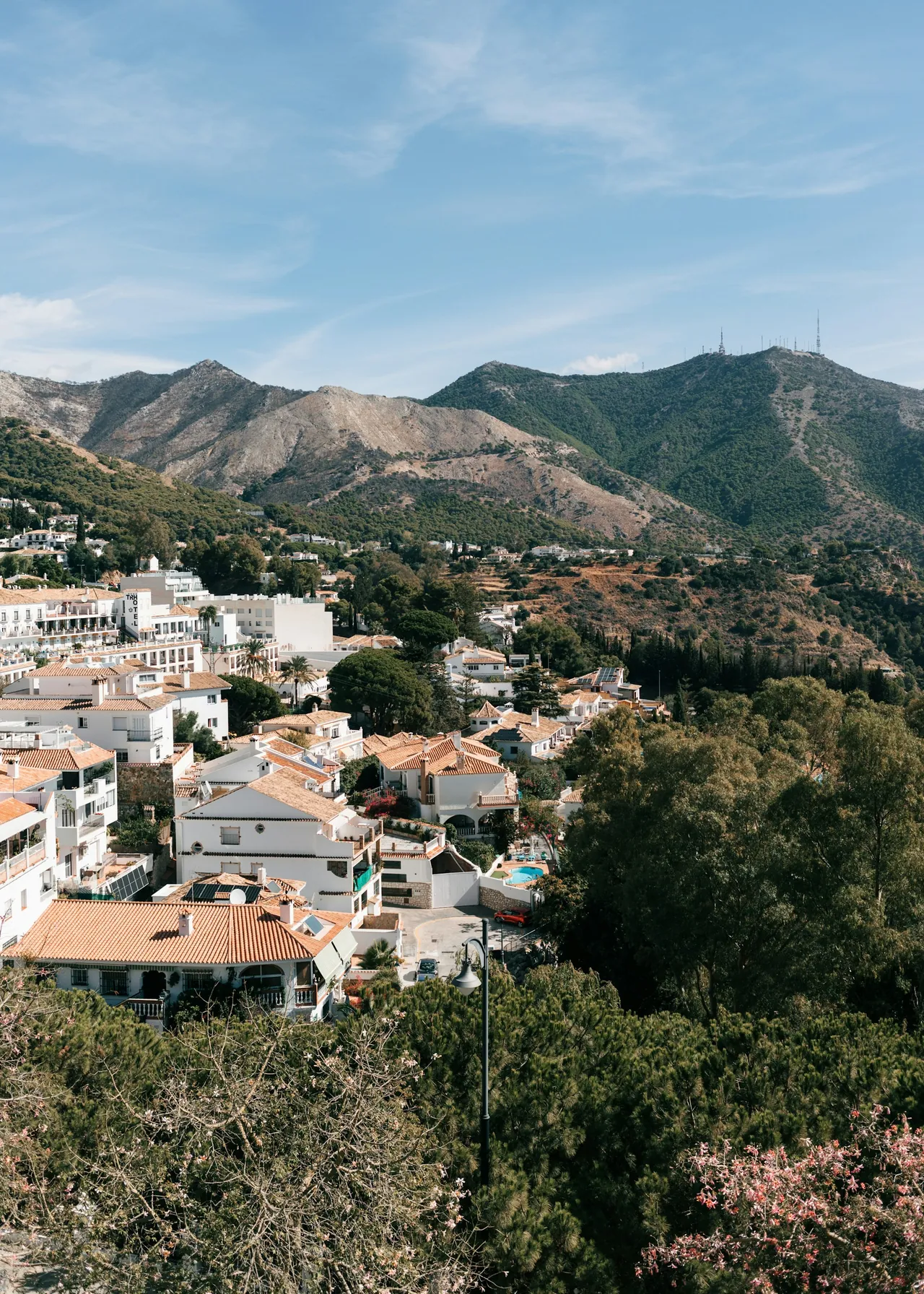 The rooftops of Mijas Pueblo with the mountains behind